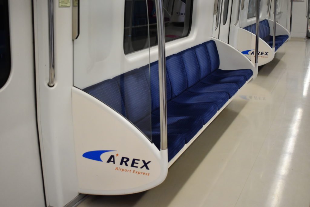 Seats on the All Stop train from Incheon Airport to Seoul